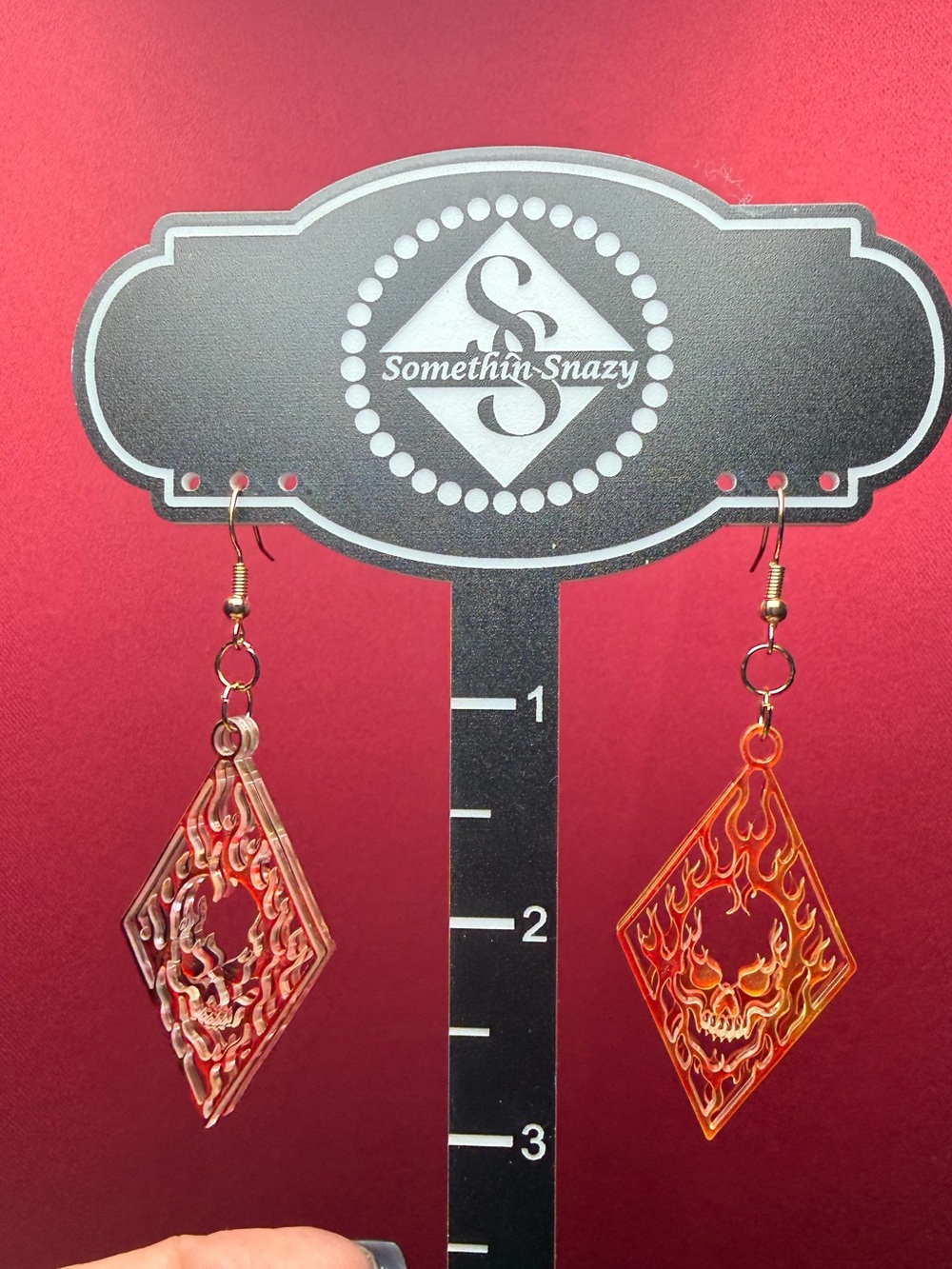 Handcrafted by me double layer skull 💀 earrings made with fire designed acrylic
